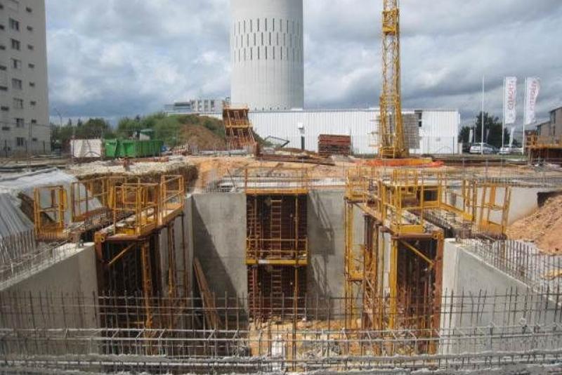 CONSTRUCTION DES MURS DE LA FOSSE DE STOCKAGE